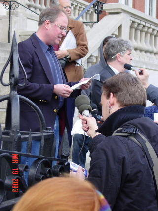 Van delivering the HAW statement at a press conference on the steps of St. Aloysius Church